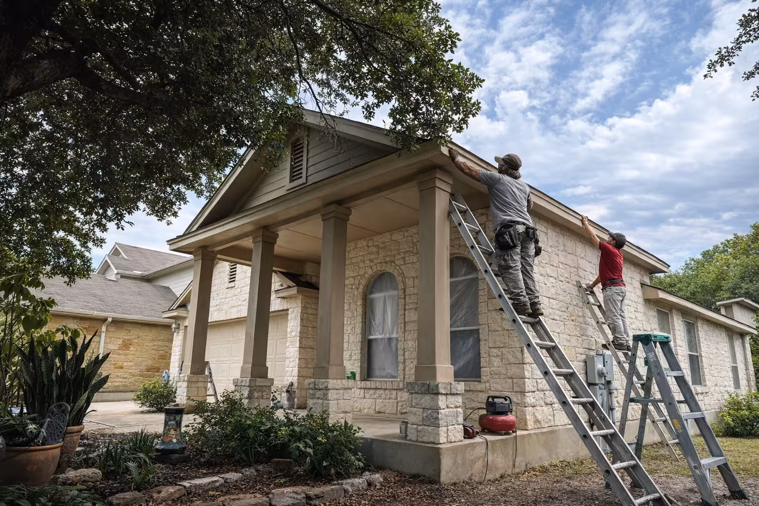 LAZO Construction crew working on a home exterior remodel in Austin, Texas