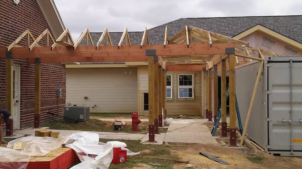 LAZO Construction room addition with steel framing in progress